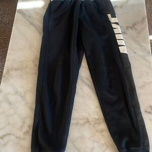 Nike- size: large, color: black and white, condition: slightly uses.